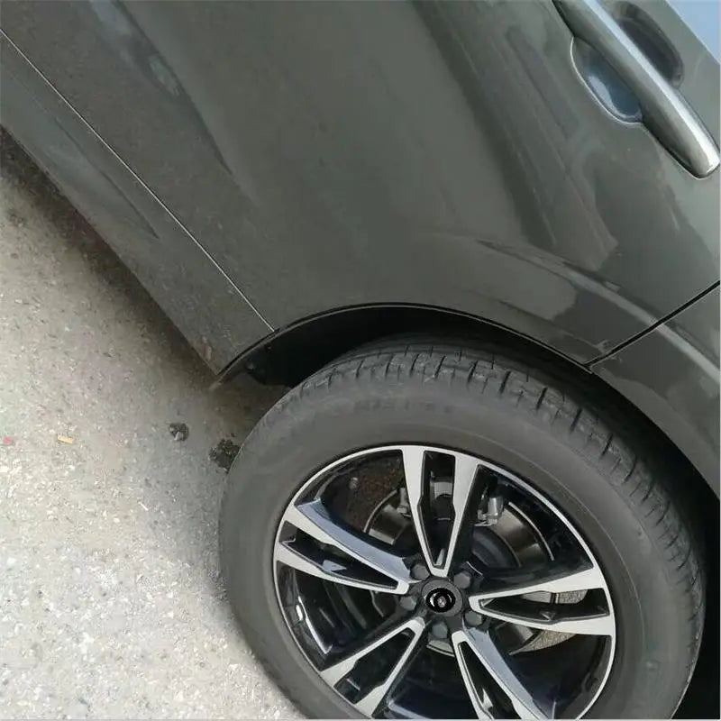 Volvo XC60 Mud Flaps (2018–2024) | Rear Wheel Fender Splash Guards with Blue Accent lifestyle view