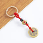 Brass Lucky Cat Keychain with Five Emperor Coins detail view
