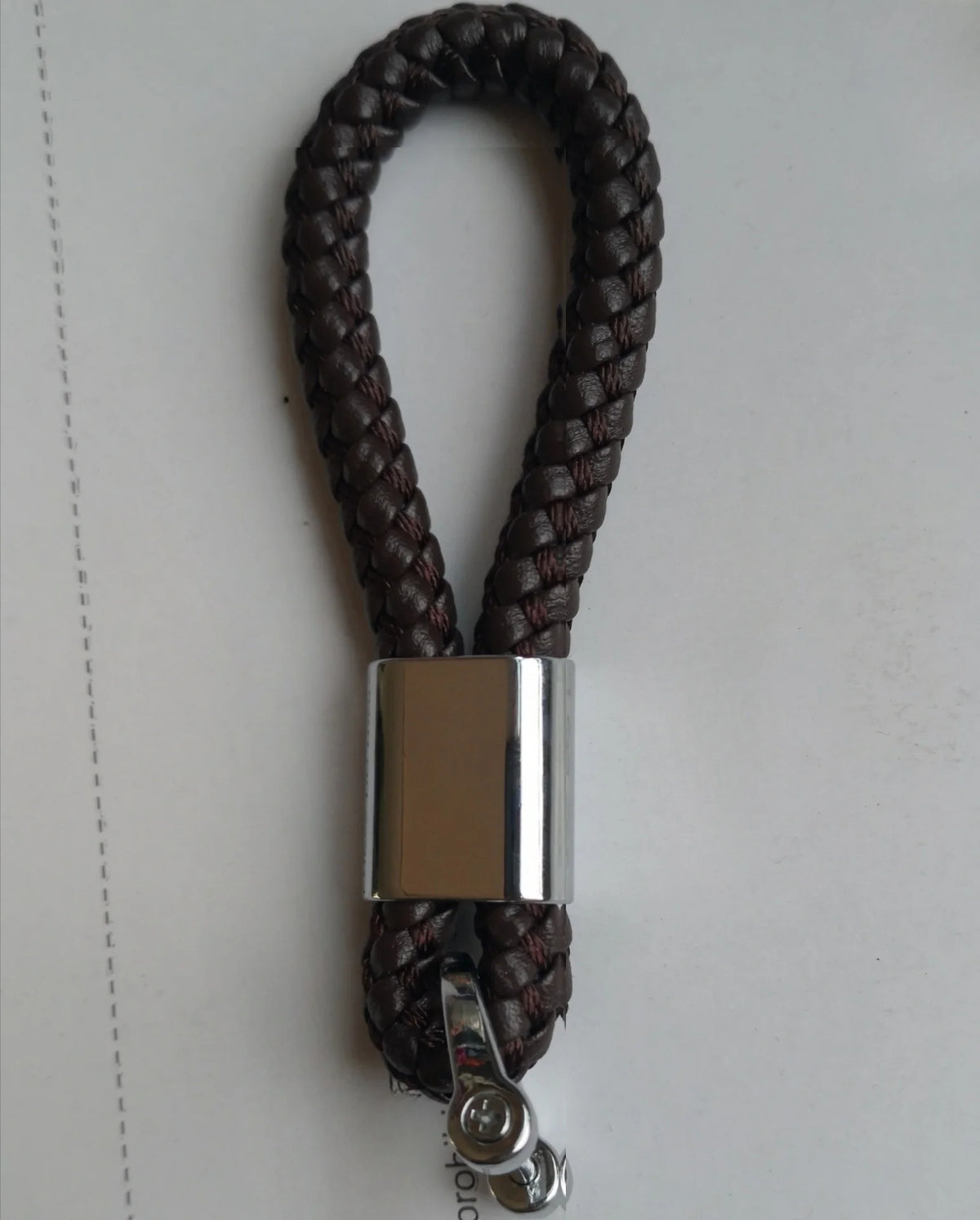 Leather Car Keychain Metal 360 Degree Rotating Horseshoe Buckle close-up view