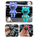 Car Air Outlet Perfume Clip Cartoon Astronaut Air Freshener Conditioning Air Outlet Ar close-up view