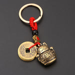 Brass Lucky Cat Keychain with Five Emperor Coins detail view