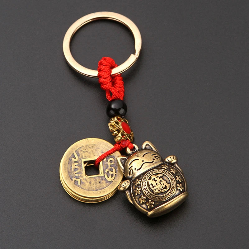 Brass Lucky Cat Keychain with Five Emperor Coins detail view