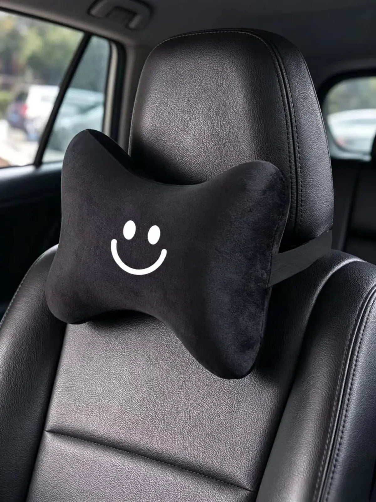 Black Bone-Shaped Car Neck Pillow with Smiley Face alternate view