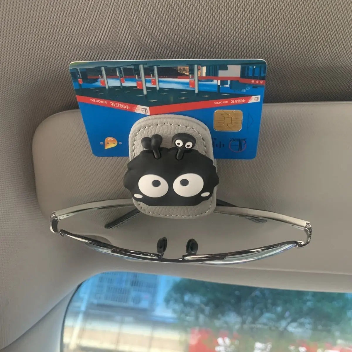 1pcs Car Glasses Clip Coal Ball Car Sunshade Storage Rack Multi functional Creative Ma close-up view