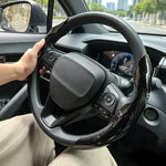 Universal Car Steering Wheel Cover Anti-slip Bright Gloss Carbon Fiber Texture Steerin close-up view