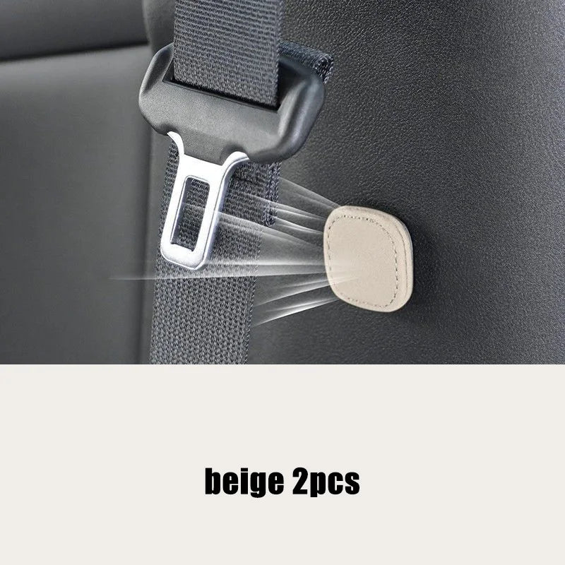 Magnetic Car Seat Belt Holder Clip Leather Seatbelt Stopper close-up view