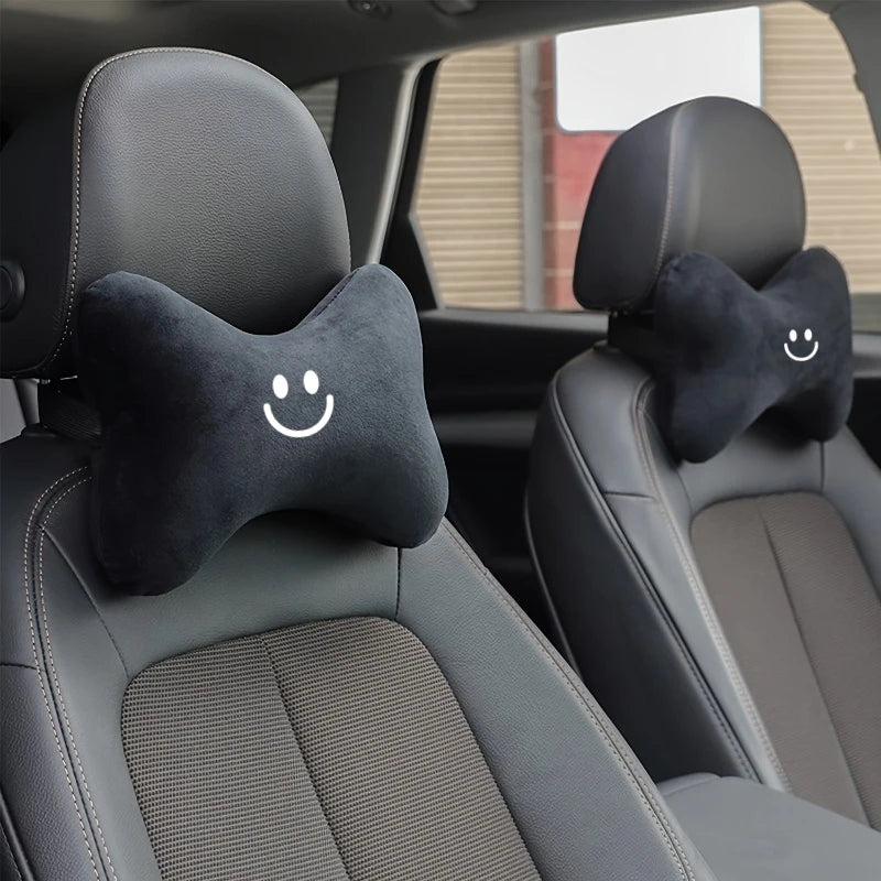 Black Bone-Shaped Car Neck Pillow with Smiley Face lifestyle view