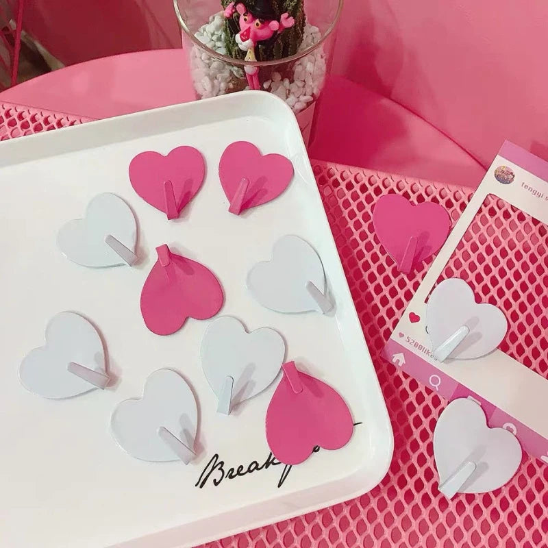 Three Heart-Shaped Hooks with Strong Adhesive,Perfect for Hanging Decorations in Kitc lifestyle view