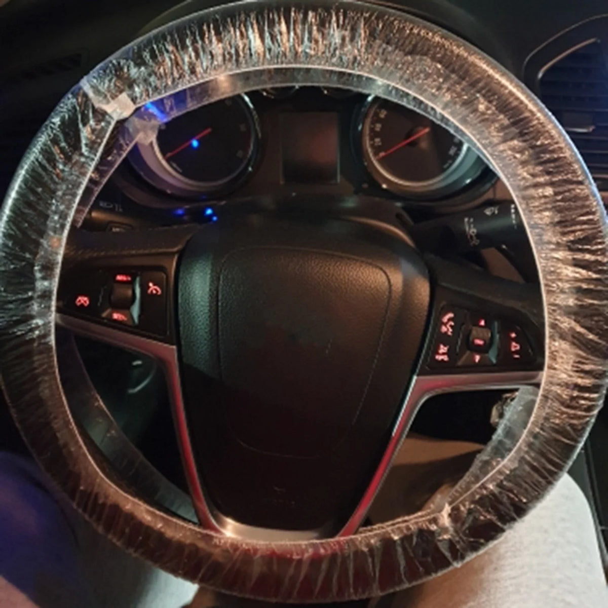 100 Pcs Universal Disposable Transparent Steering Wheel Cover close-up view