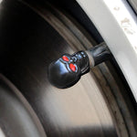4Pcs Skull Valve Caps ABS Car Wheel Plugs | Tire Valve Covers for Cars Motorcycles lifestyle view