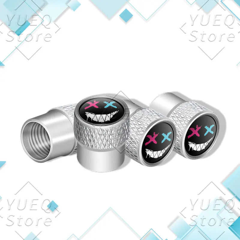 4Pcs XX Smiling Face Logo Pattern Car Tire Valve Caps | Universal Aluminum Tire Stem C close-up view